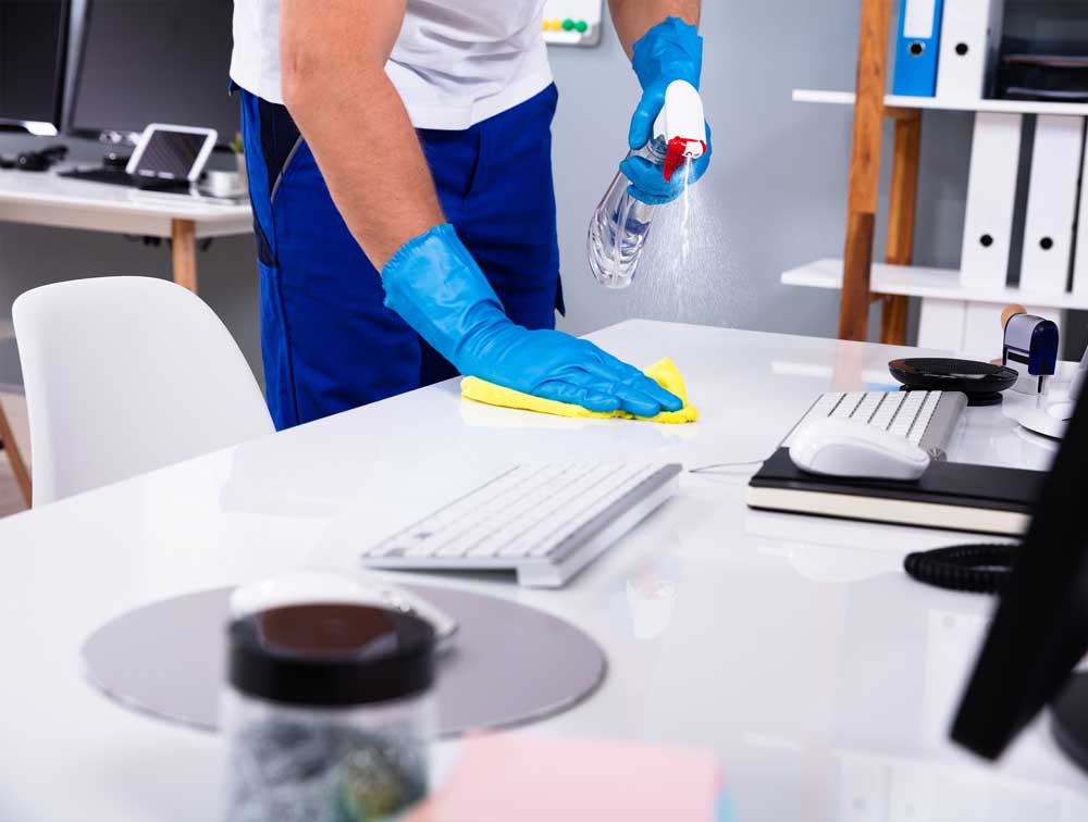 Janitor Cleaning Desk | US Dept of Homeland Security | A James Global
